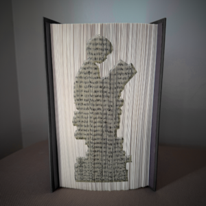 boy reading on books book folding pattern preview - Cut & Fold