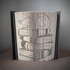 cat on books book folding pattern preview - Cut & Fold