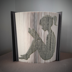 girl reading book folding pattern preview - Cut & Fold