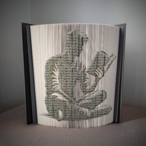 man reading book folding pattern preview - Cut & Fold